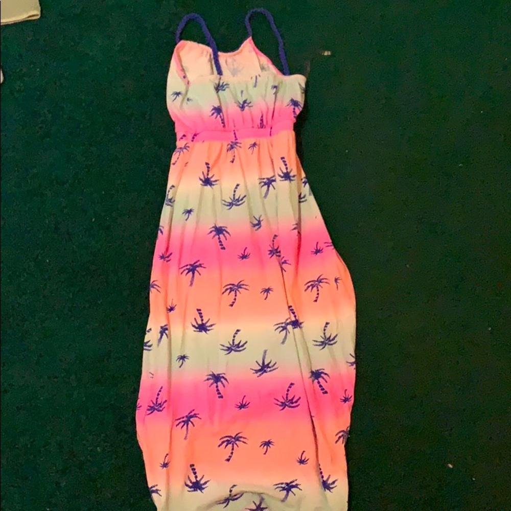 This is a dress with palms trees on it
